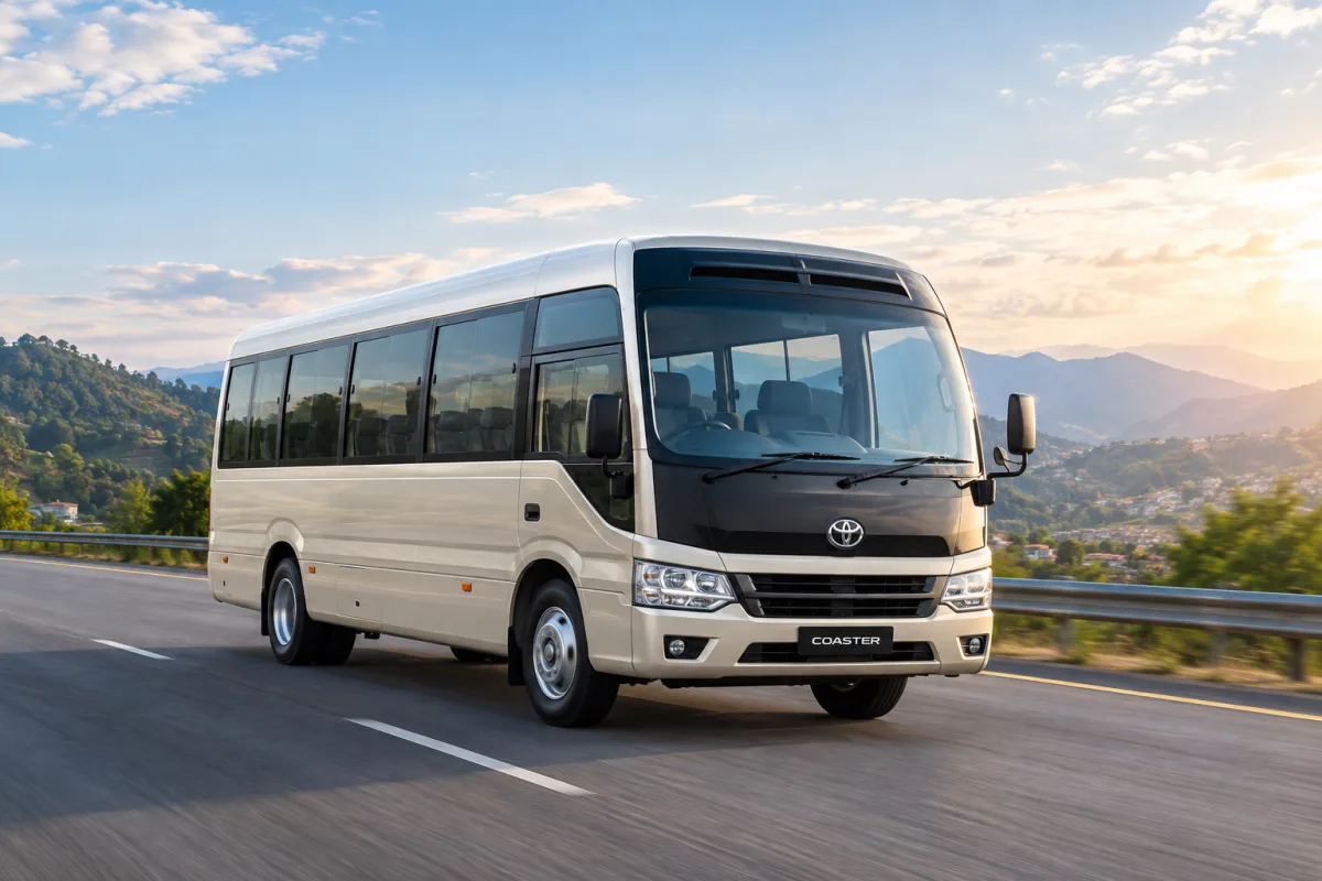 Bus rental in Nepal - Toyota Coaster tourist bus on the highway